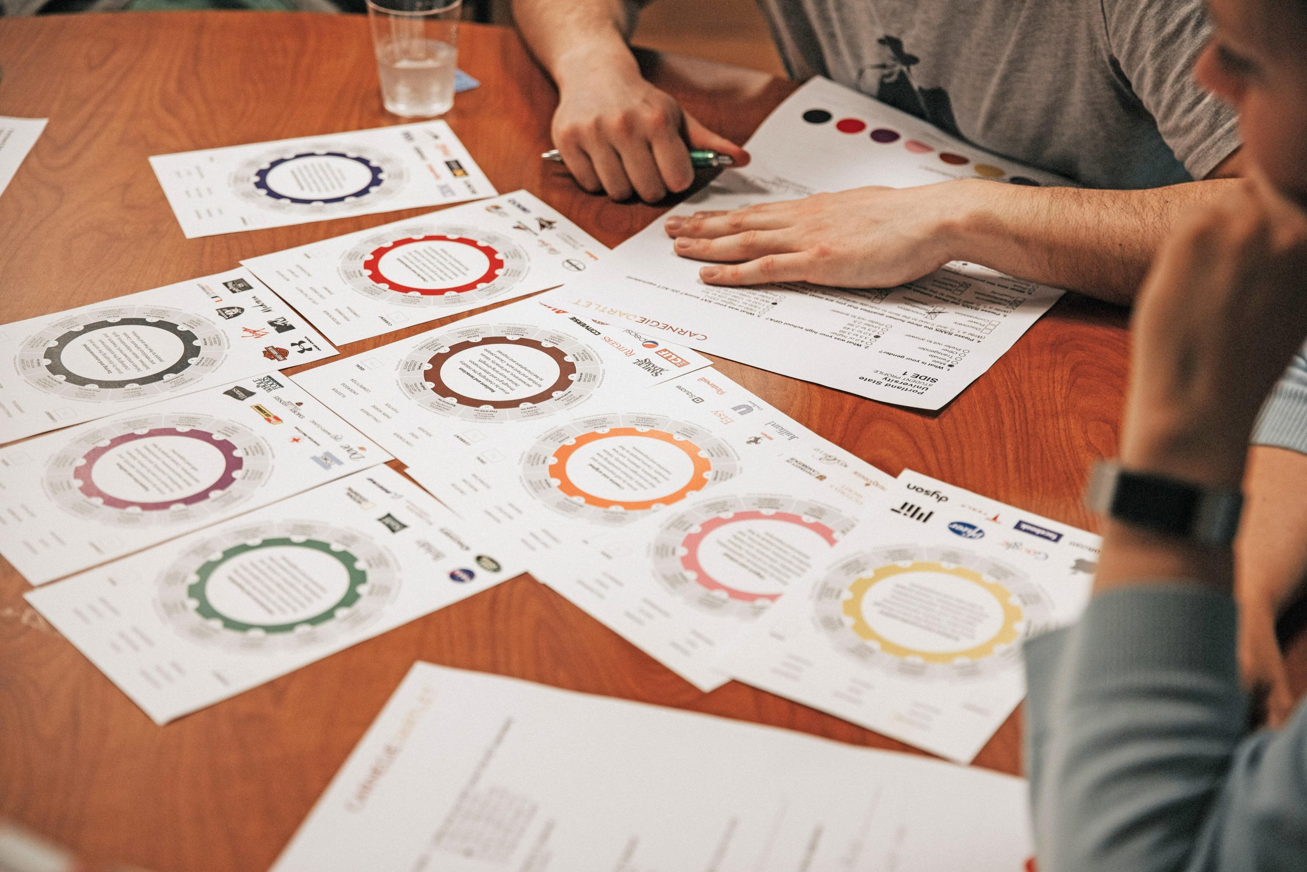 Carnegie archetypes printed on papers, spread out on a table