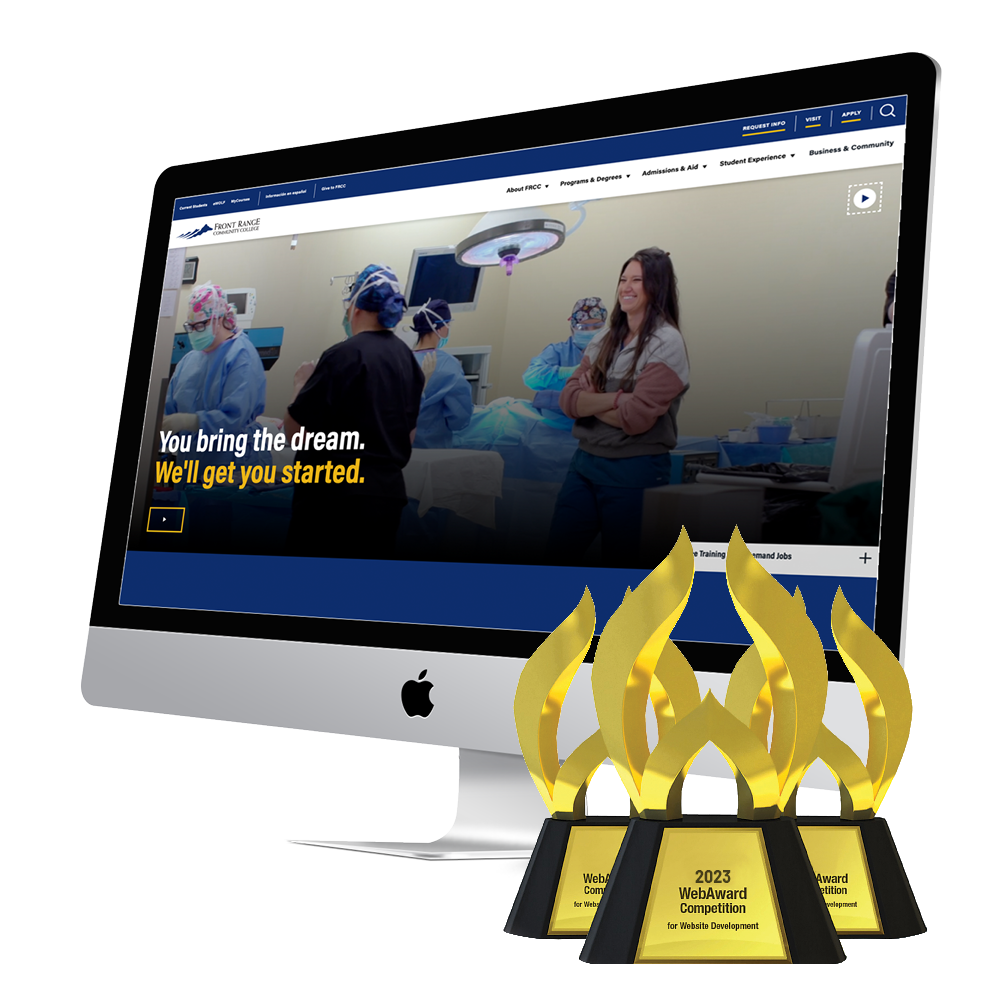 A computer showing a hospital website, with five gold 2023 WebAward trophies in front of the screen.