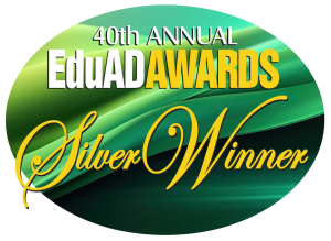 Oval badge with "40th Annual EduAD Awards Silver Winner" in gold and white on a green background.