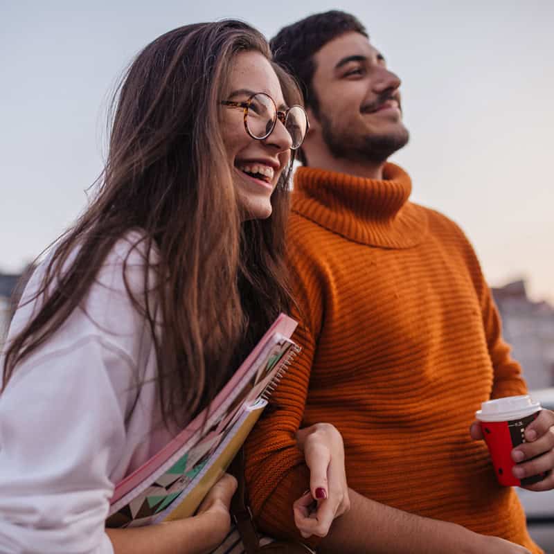 Athletic woman outdoors at football field.