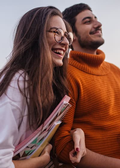 Athletic woman outdoors at football field.