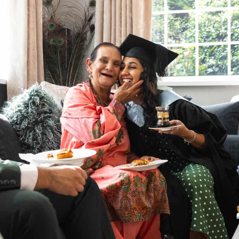 Elderly woman with graduate student.
