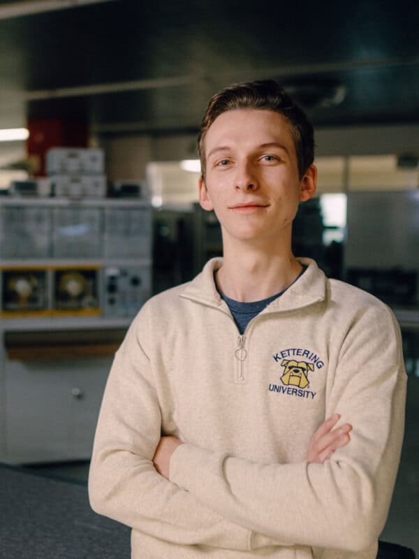 Kettering University Student standing with arms crossed