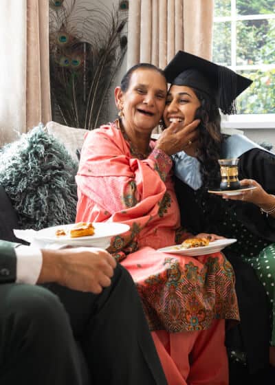 Elderly woman with graduate student.