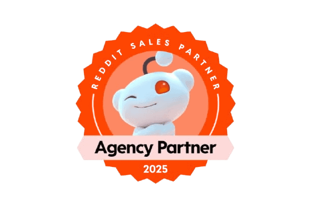 Reddit Sales Partner 2025 badge featuring a winking Reddit mascot and "Agency Partner" text—perfect for a higher education digital marketing agency.