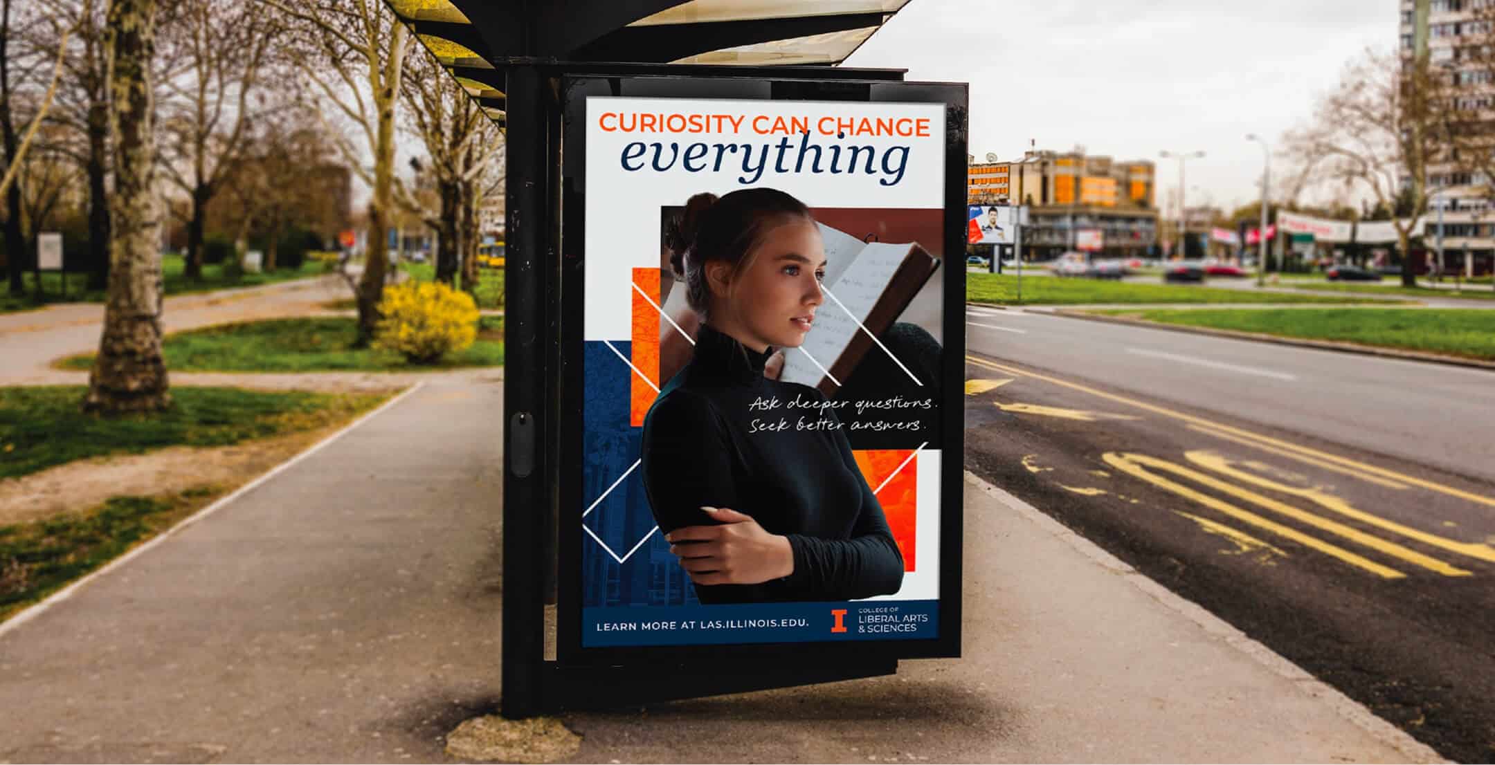 Bus stop ad shows a woman with text: "Curiosity can change everything. Ask deeper questions. Seek better answers.